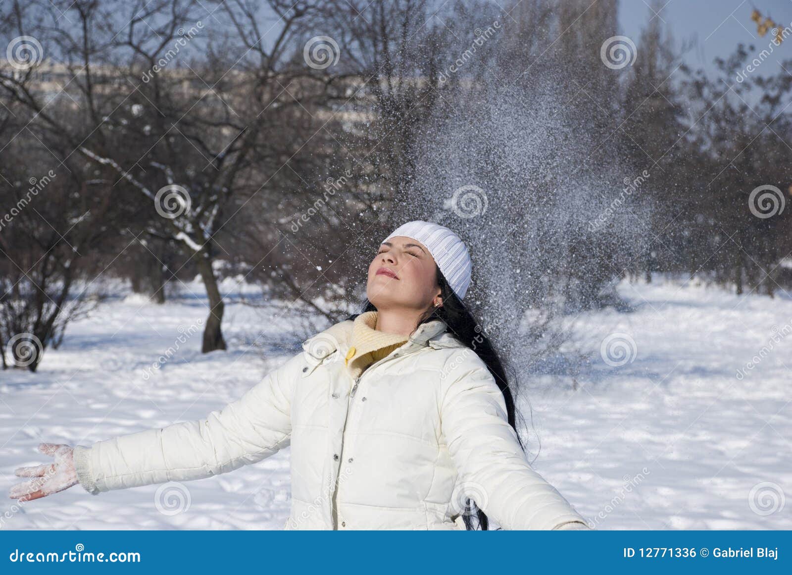 Woman Throw Snow Up Royalty Free Stock Image - Image: 12771336