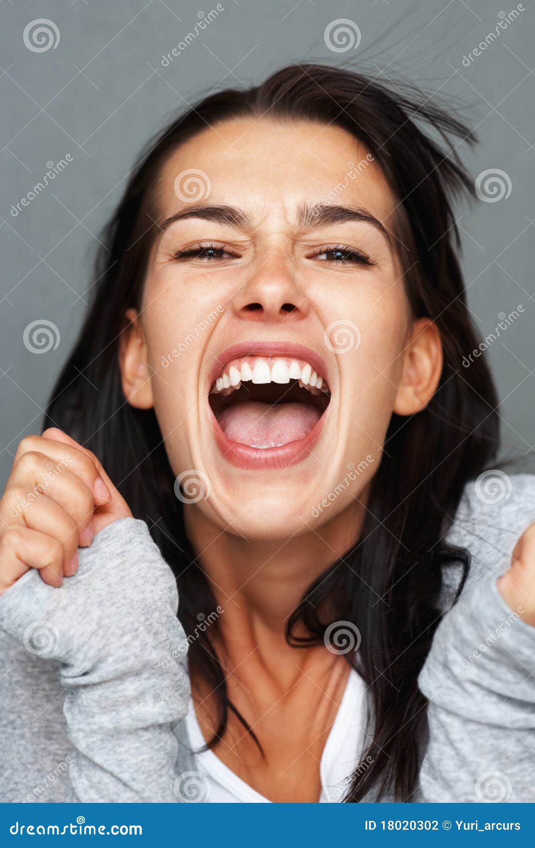 Woman Throwing Arms Up and Yelling in Frustration Stock Photo Image