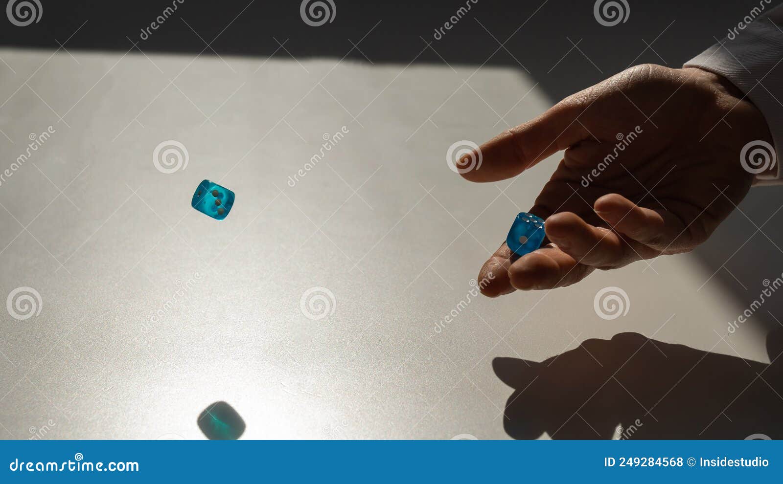 Woman Throws a Pair of Blue Transparent Dice. Stock Photo Image of portrait, casino 249284568