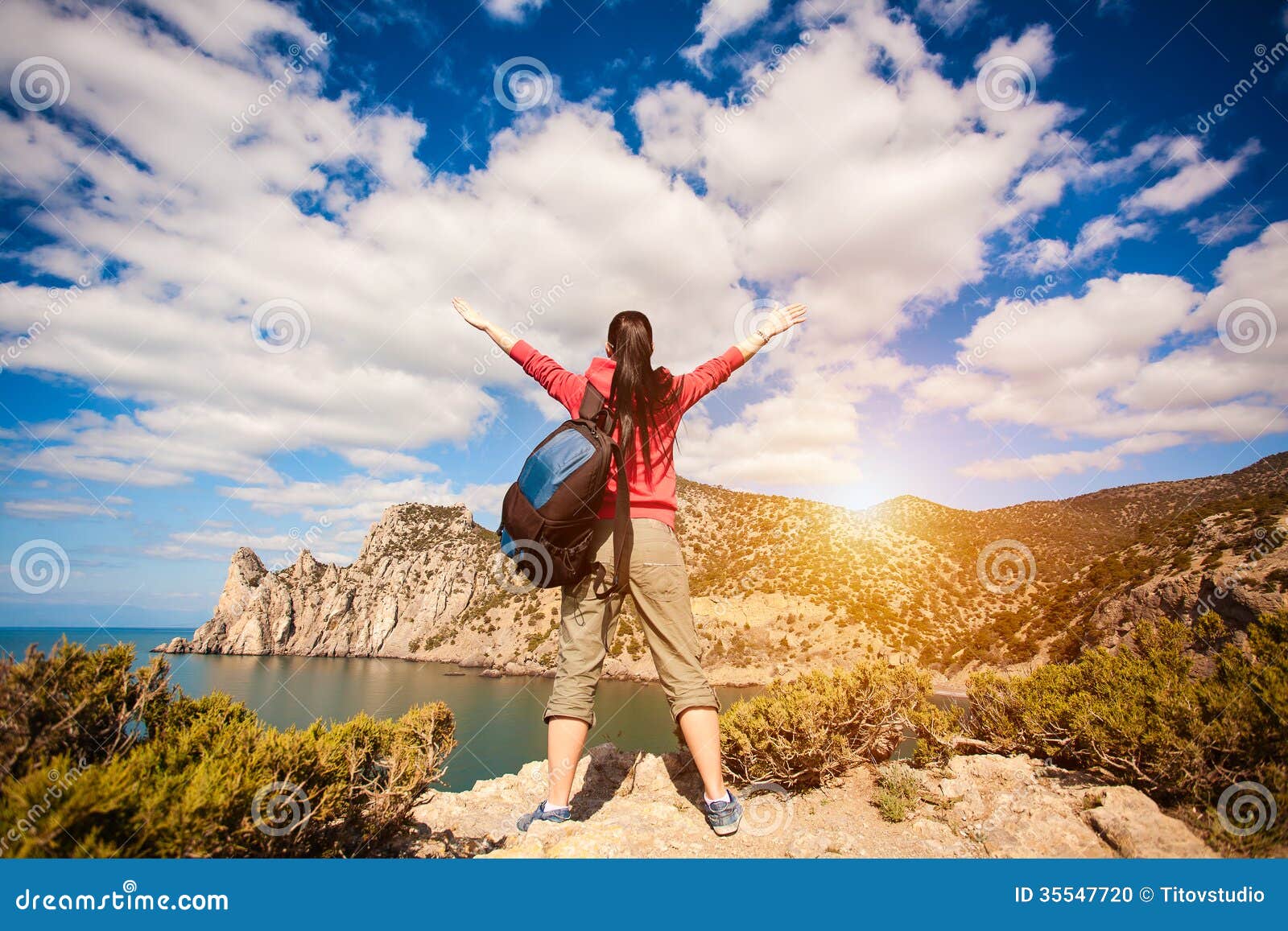 woman tourist is enjoying landscape