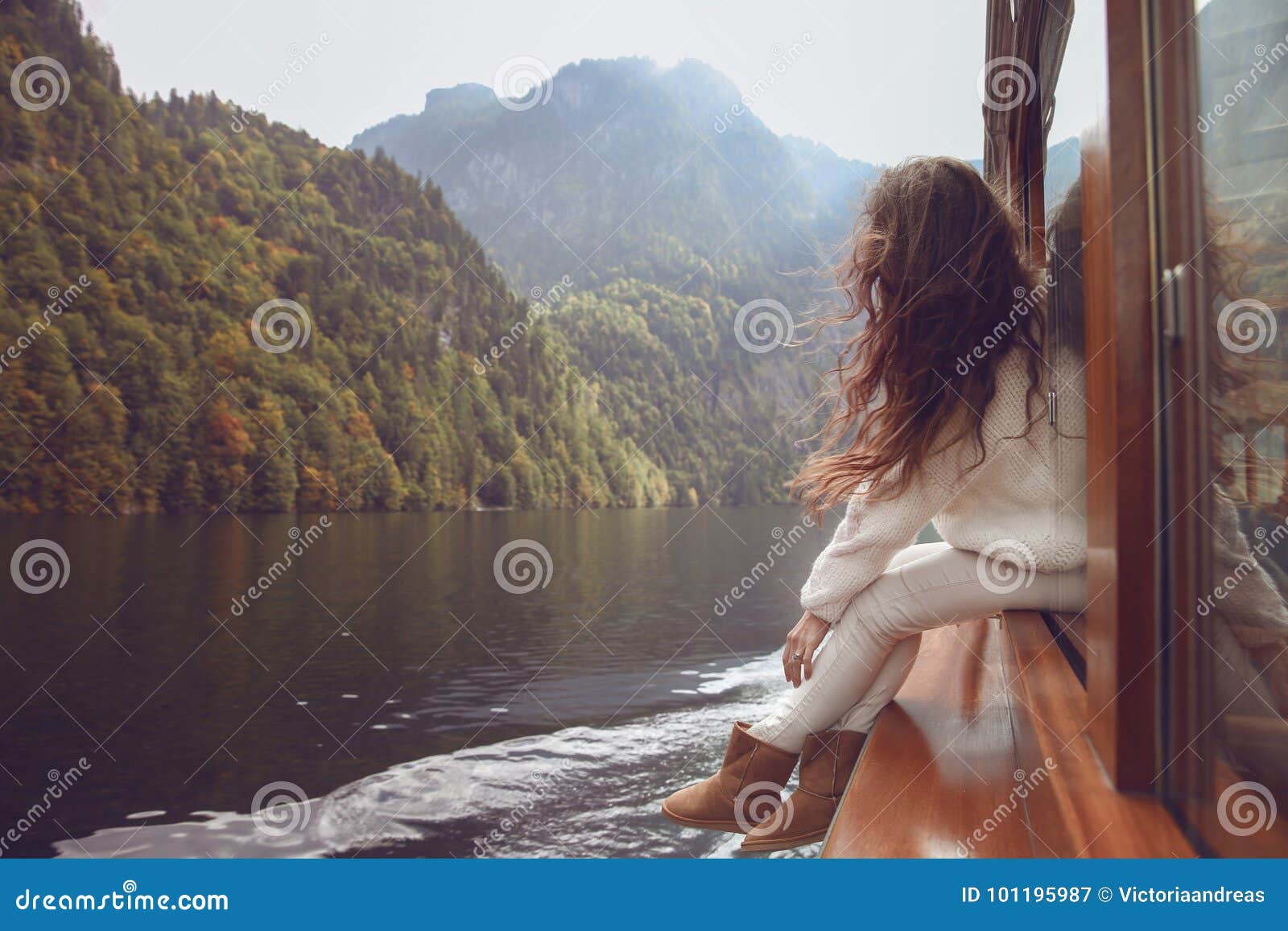 woman tourist going on boat in konigssee lake, berchtesgaden, ge