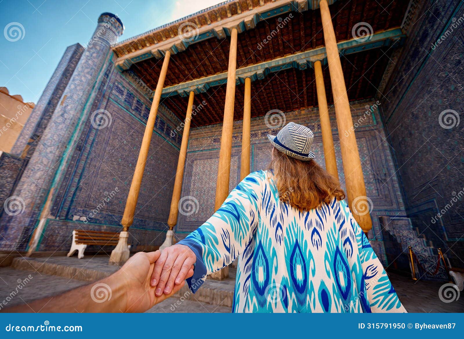 woman tourist at old city khiva in uzbekistan