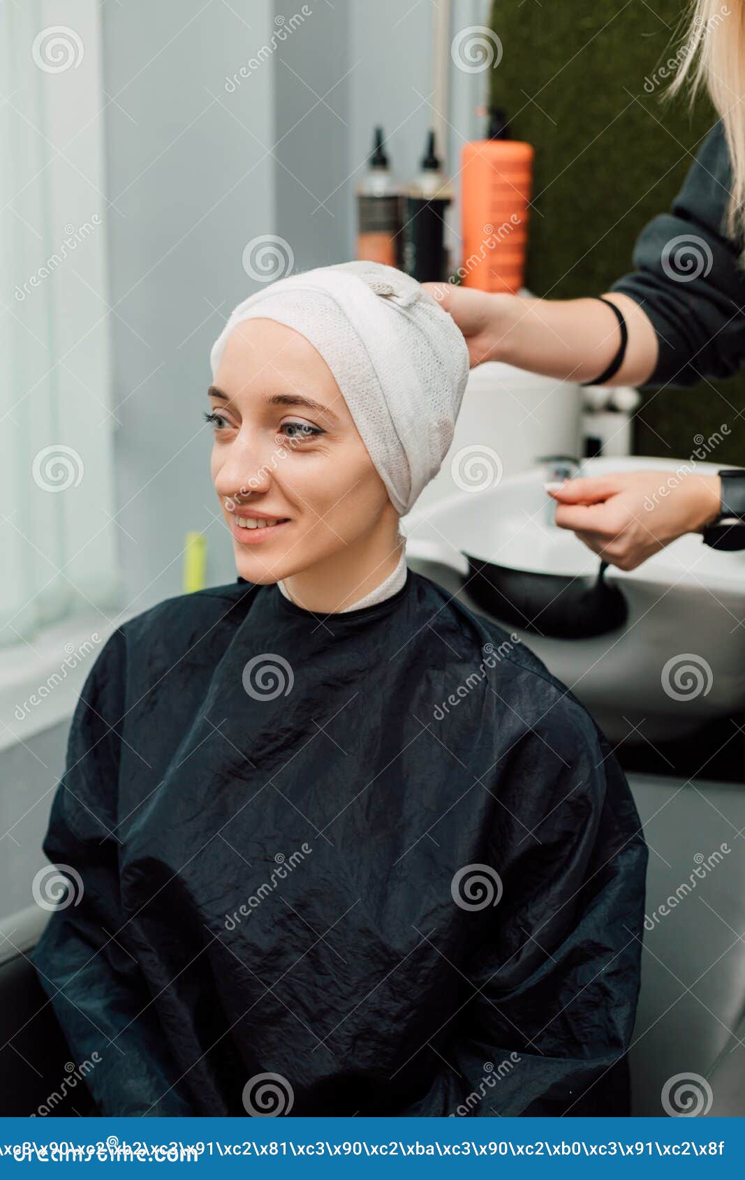 A Woman with a Towel on Head. Hair Washing, Treatment in the ...