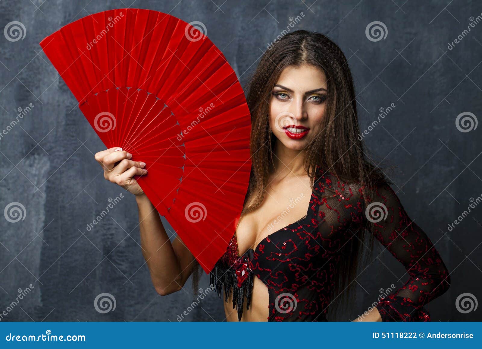 Woman Traditional Spanish Flamenco Dancer Dancing In A Red Dress Stock