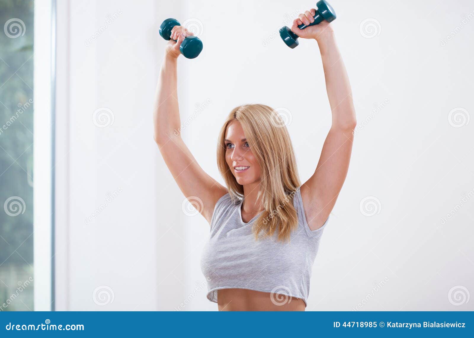 Woman training arm muscles stock image. Image of body 44718985