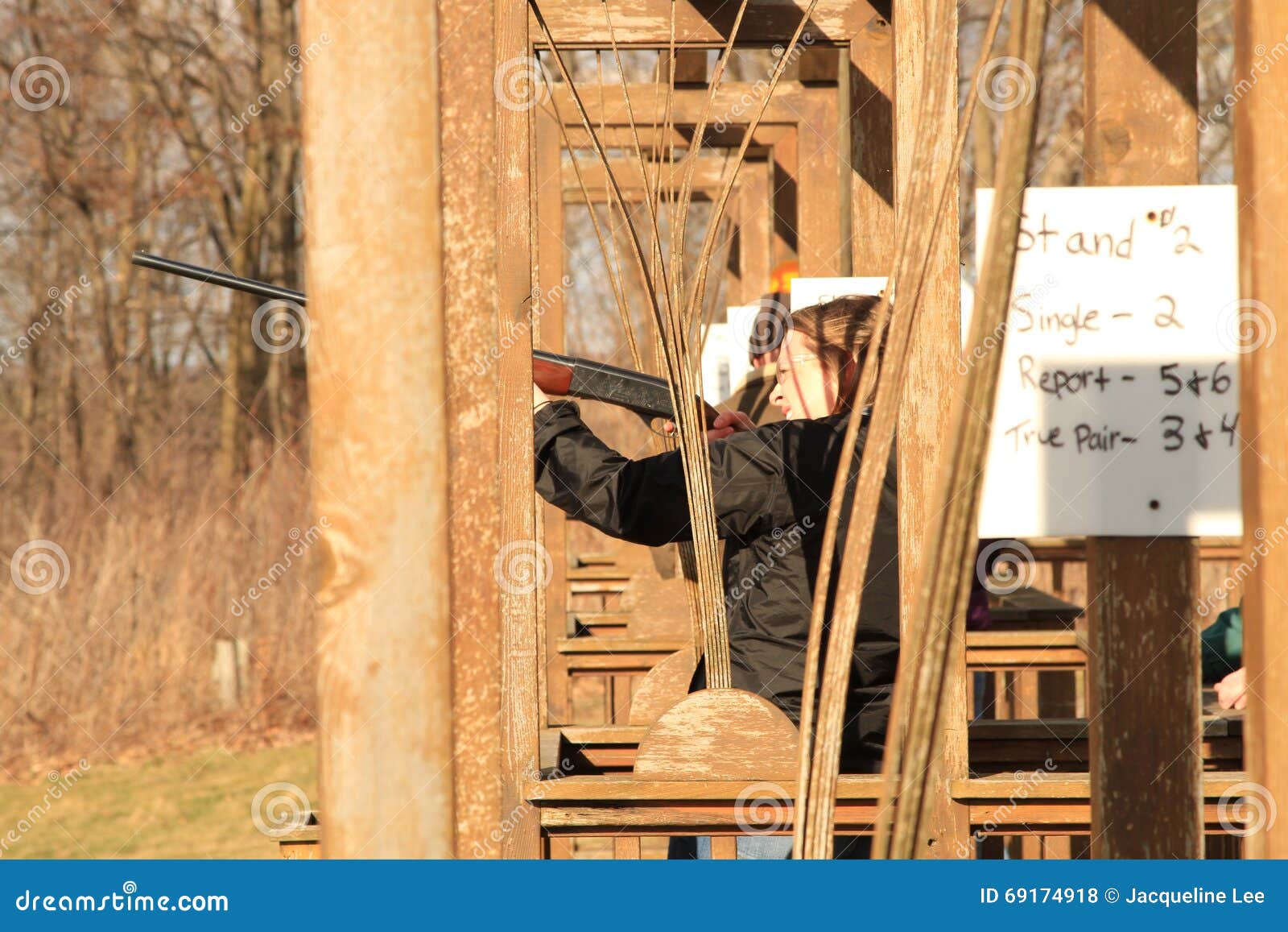 Woman trap shooting range stock photo. Image of concentrate  69174918