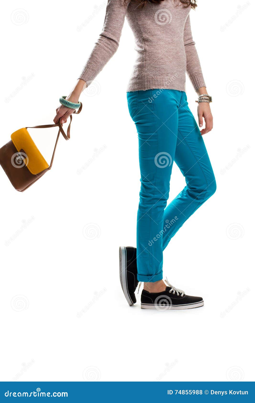 Woman in turquoise pants. stock photo. Image of pants - 74855988