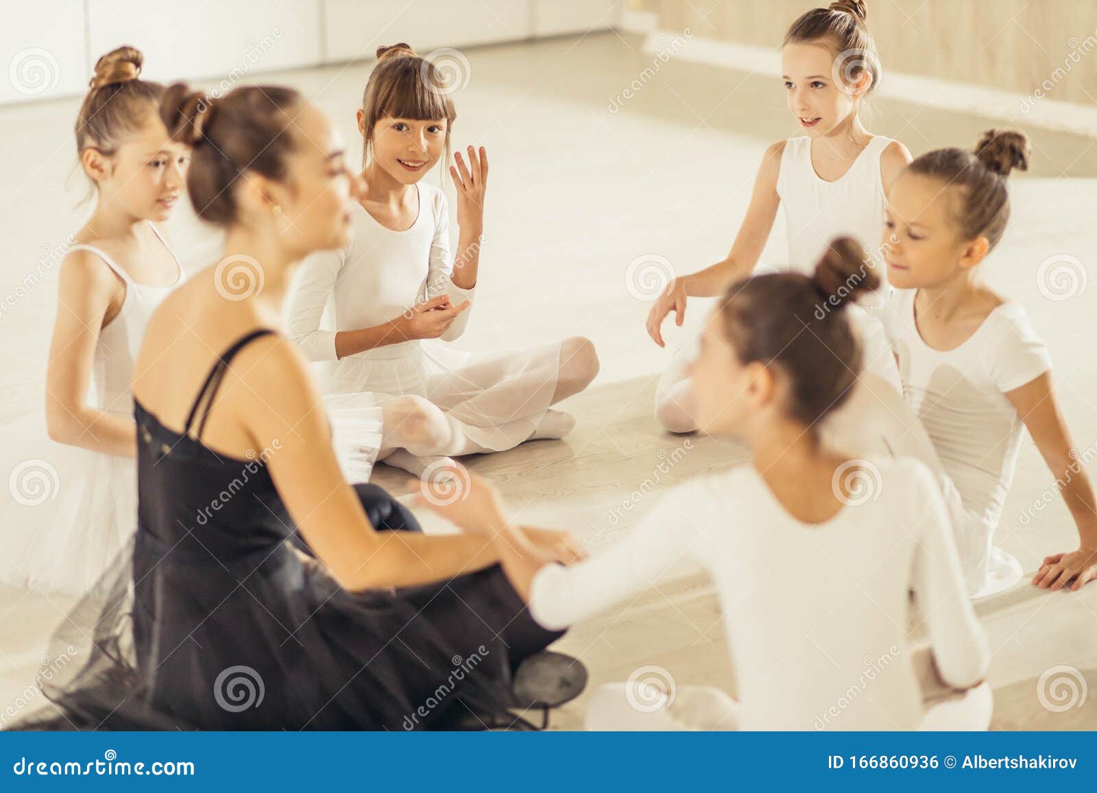 Woman In Tutu Skirt Sit With Kids On Floor Stock Photo Image Of