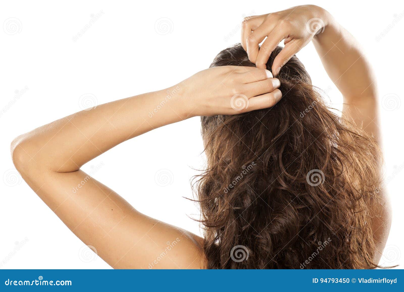 Woman tying her hair stock photo. Image of young, background ...