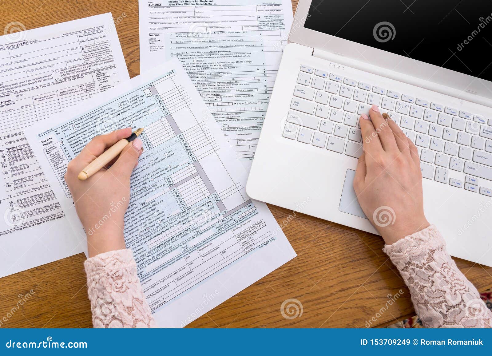 Woman Typing on Laptop and Filling 1040 Form Editorial Stock Image ...