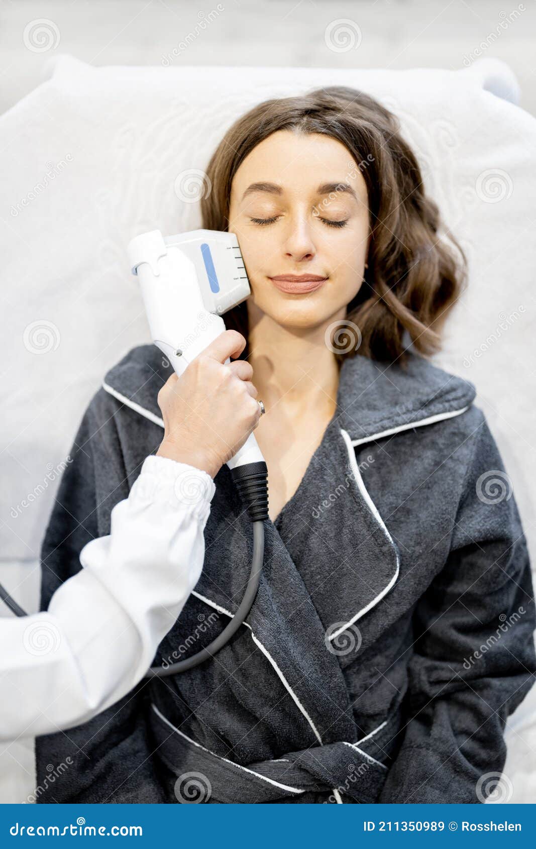 Woman On Ultrasound Face Lifting Procedure In Cosmetology Salon Stock