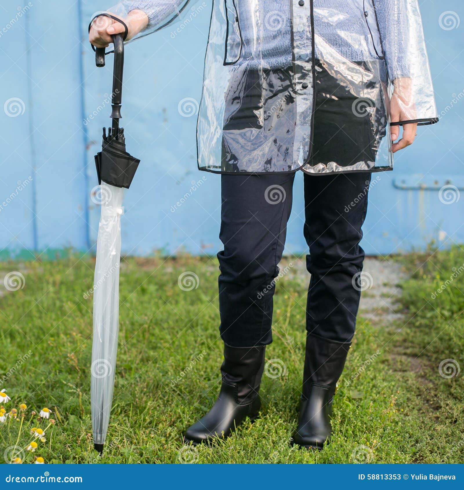 Woman with umbrella stock image. Image of boots, oilskin 58813353