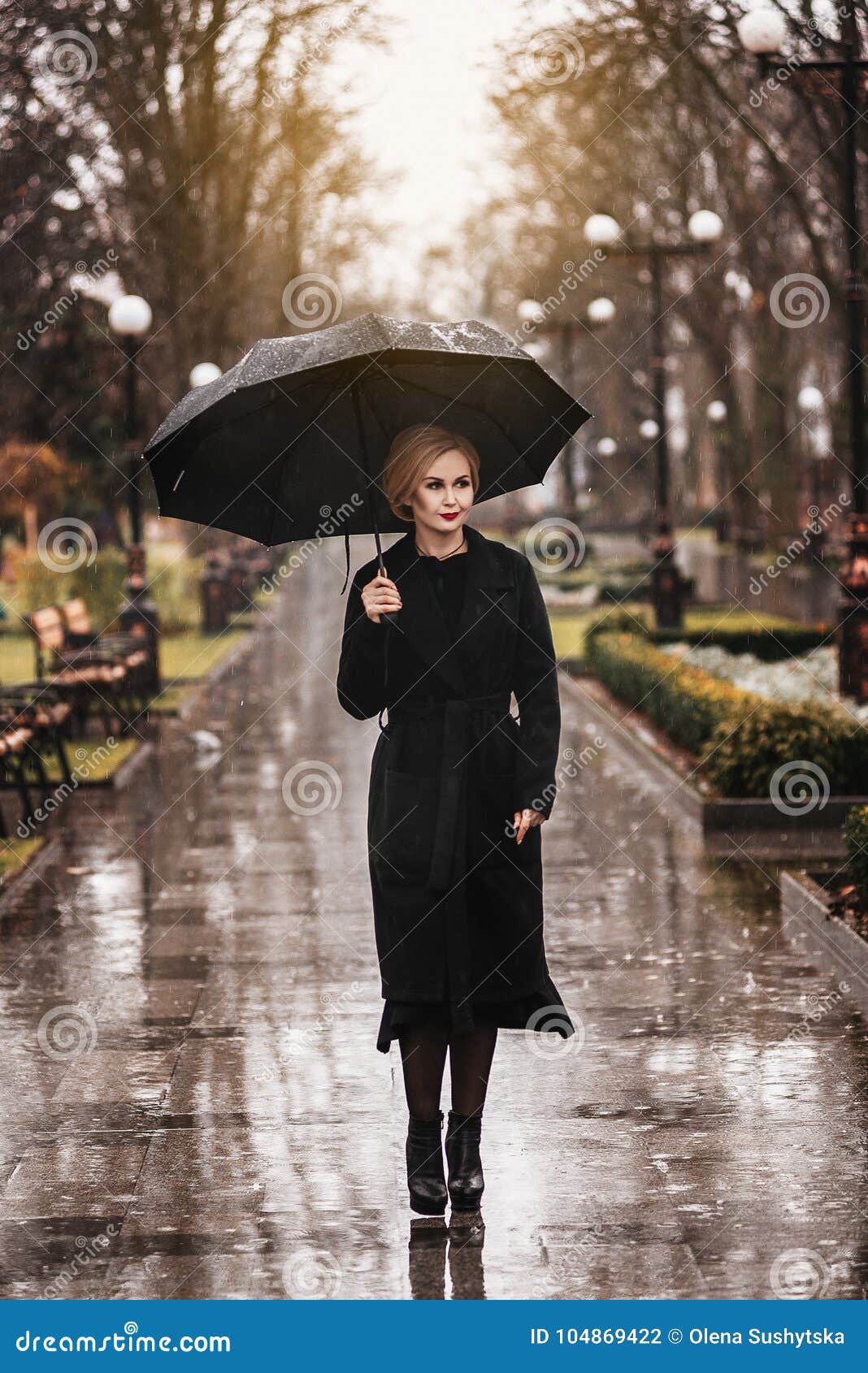 Woman with Umbrella in the Rain Stock Photo - Image of blond, lady ...