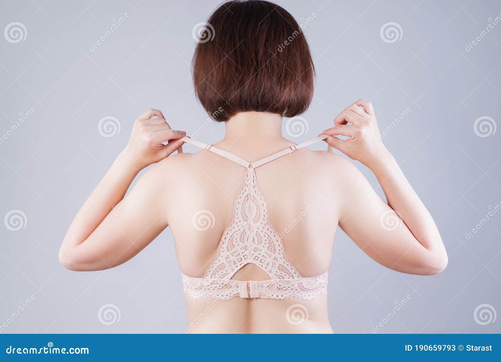 Woman Undressing and Unhooking Her Bra Stock Image - Image of people,  beauty: 190659793