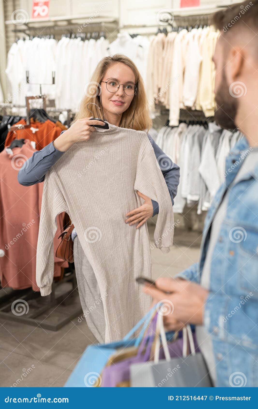 Woman Updating Her Wardrobe Stock Image - Image of smiling, elegance ...