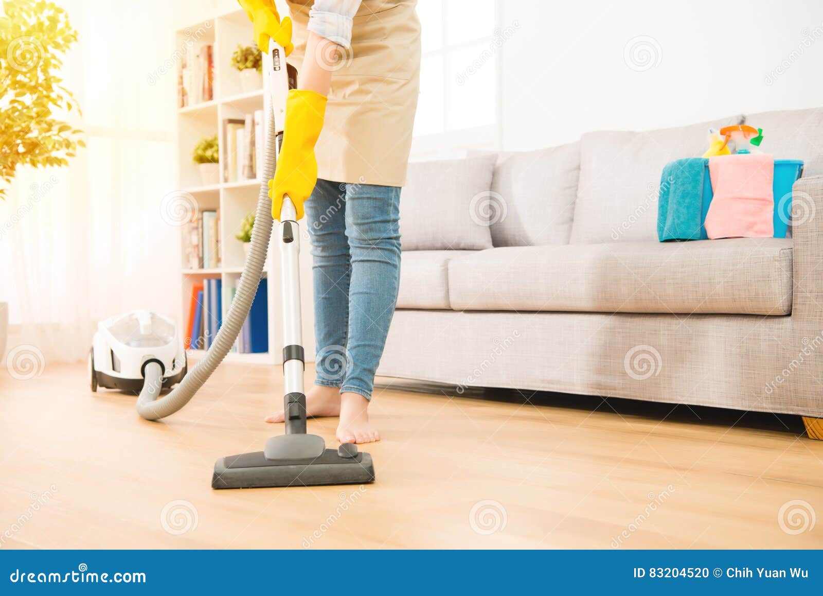 woman use vacuum cleaner to cleaning