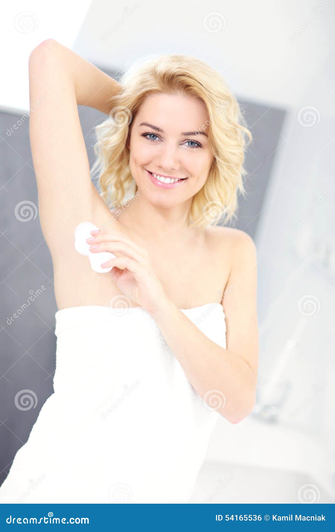 Woman using deodorant stock photo. Image of antiperspirant 54165536