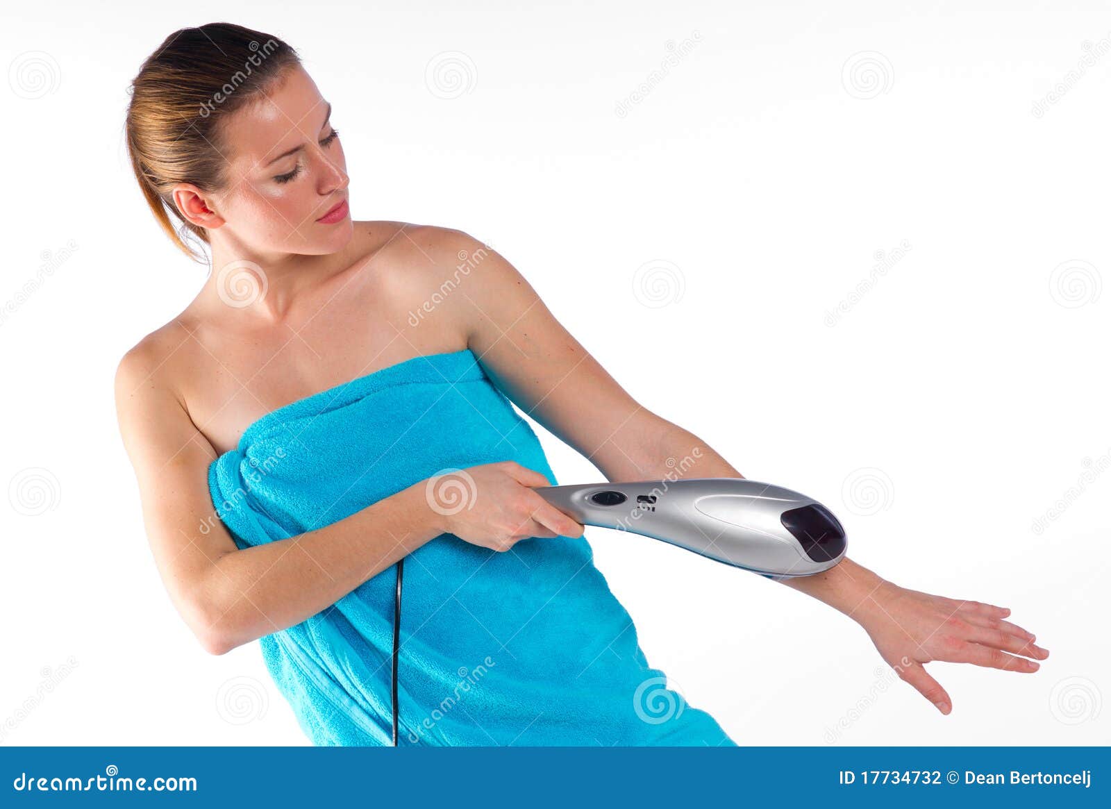 woman using electric massager