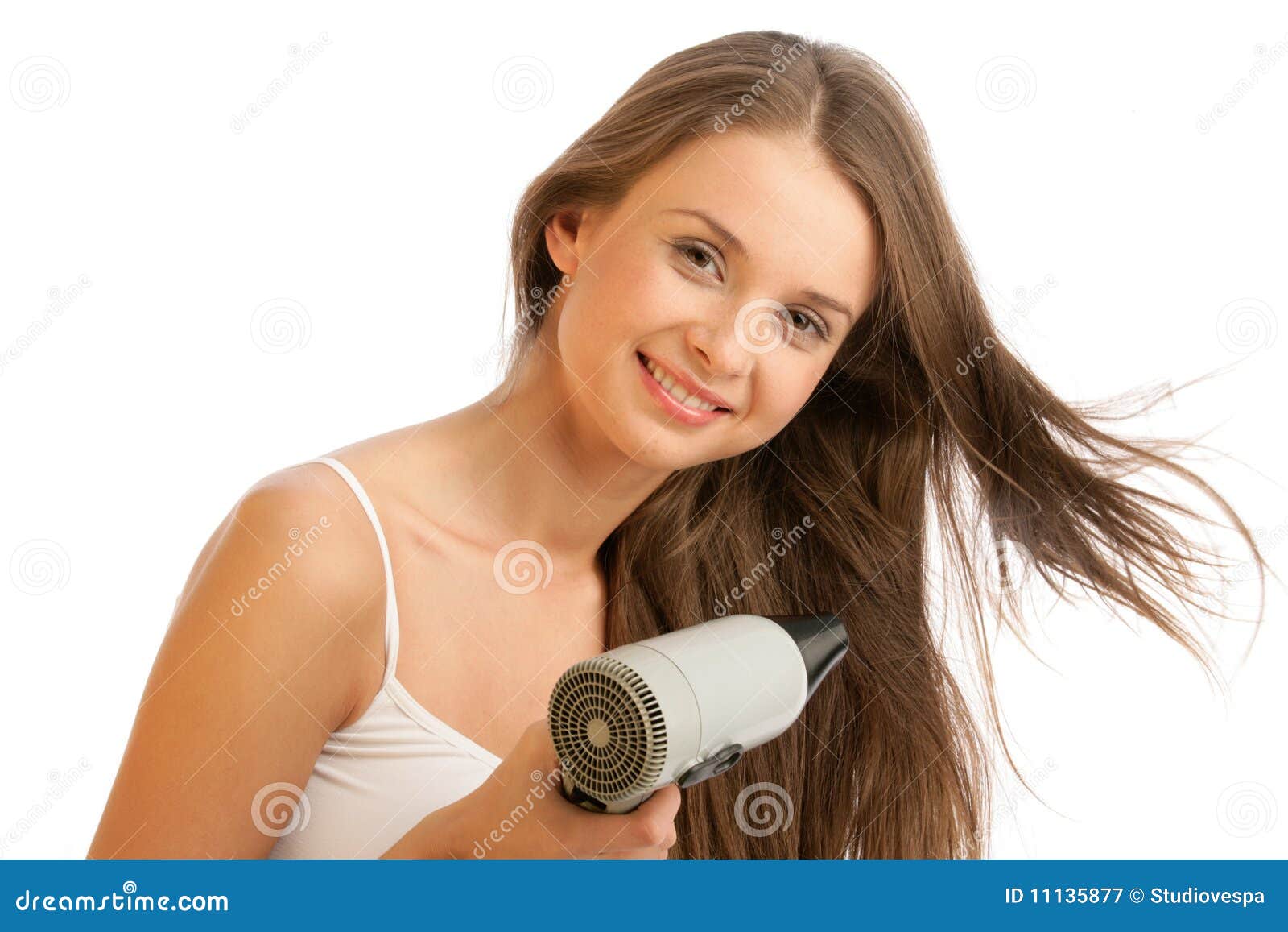 Woman using hairdryer stock image. Image of drier, drying 11135877