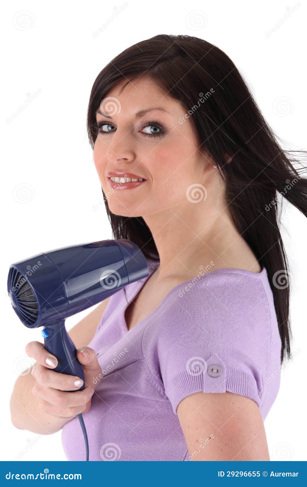 Woman using a hairdryer stock image. Image of hold, cute 29296655