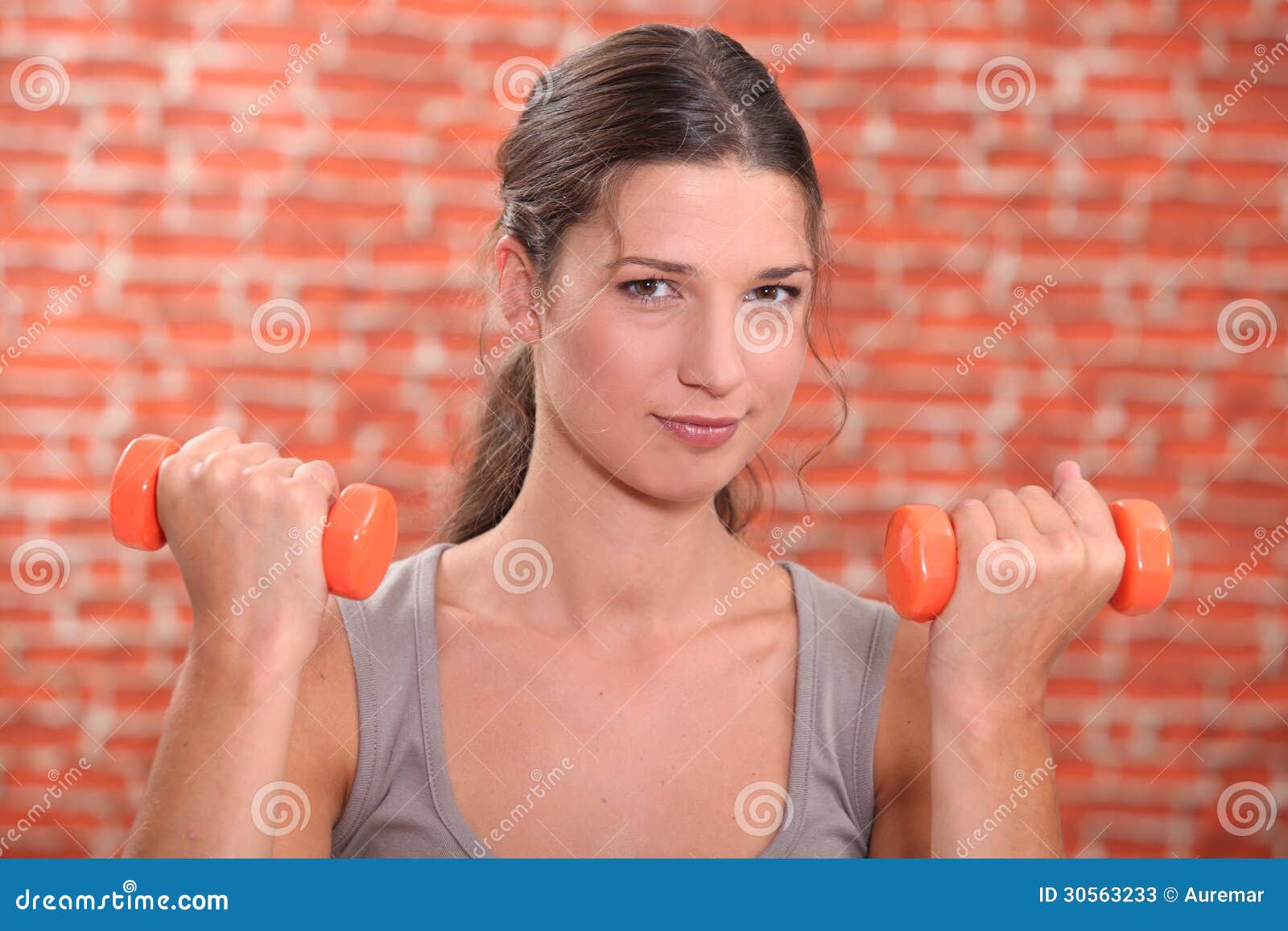 Woman using hand weights stock image. Image of healthy 30563233