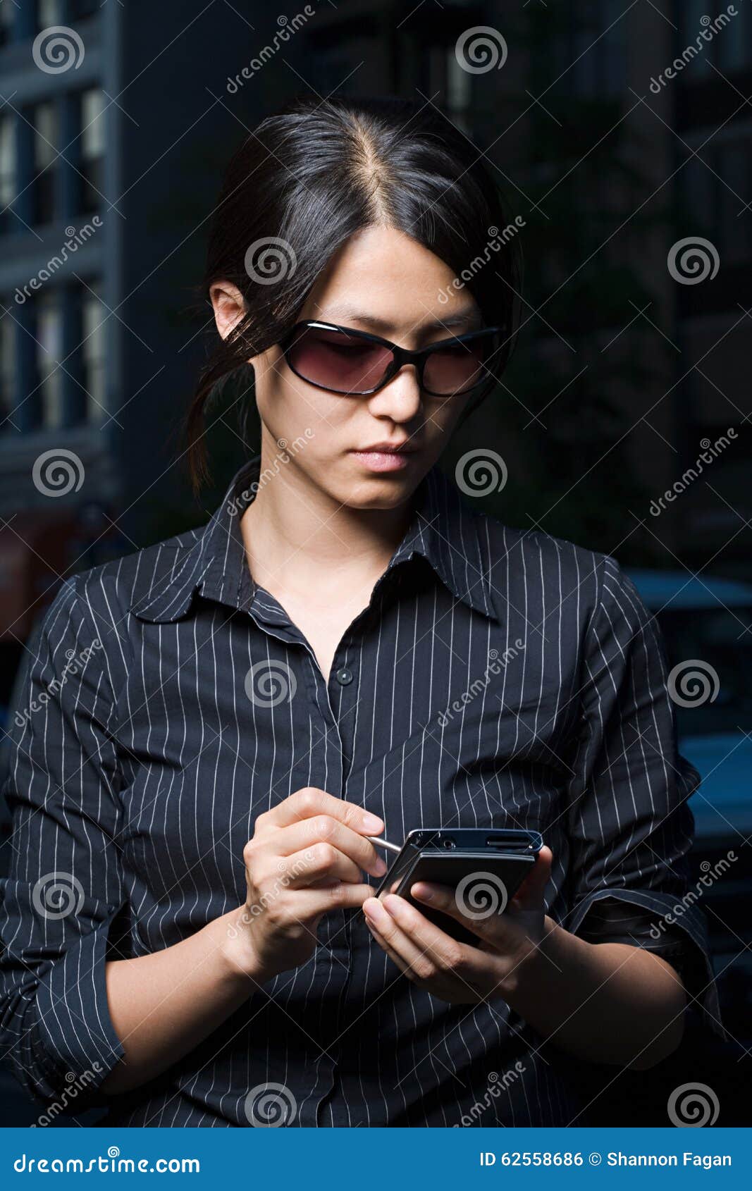 Woman Using Handheld Computer Stock Photo Image of living, dialing