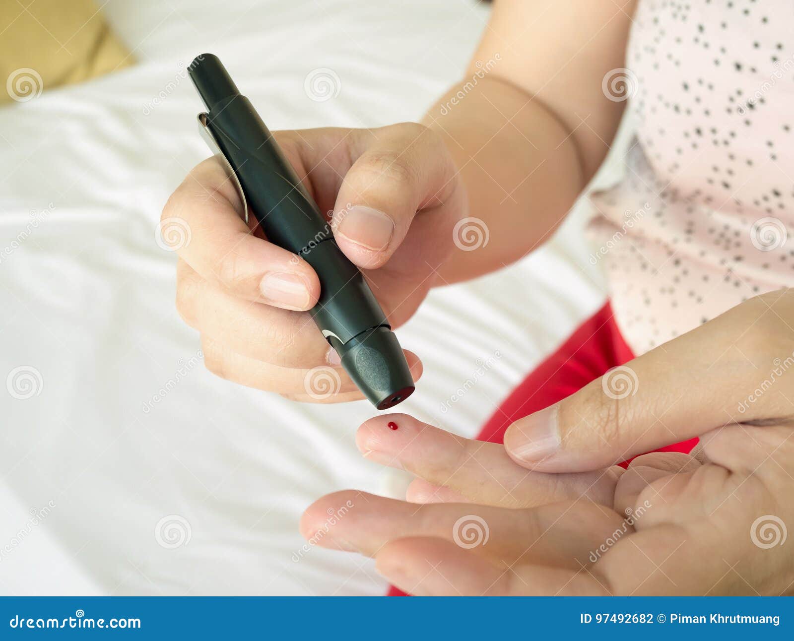 Woman Using Lancelet on Finger, Diabetes Test Stock Photo Image of