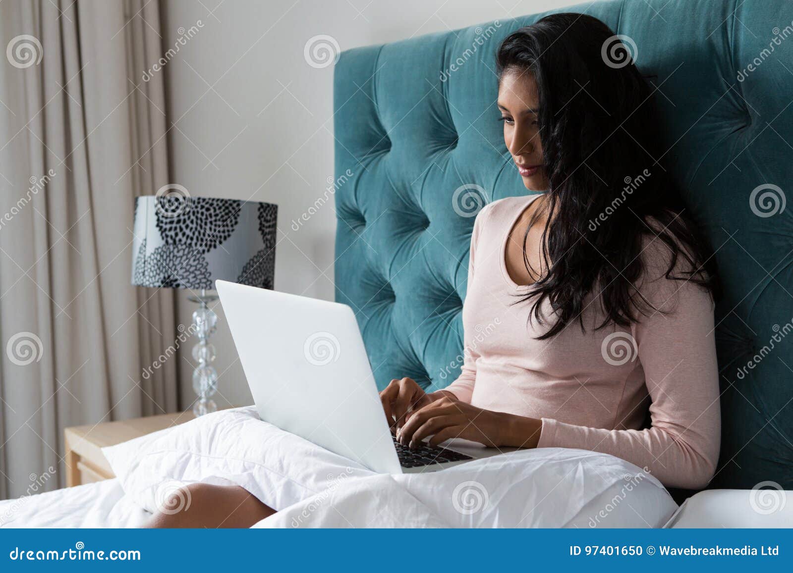 Woman Using Laptop on Bed at Home Stock Photo Image of indoors, black