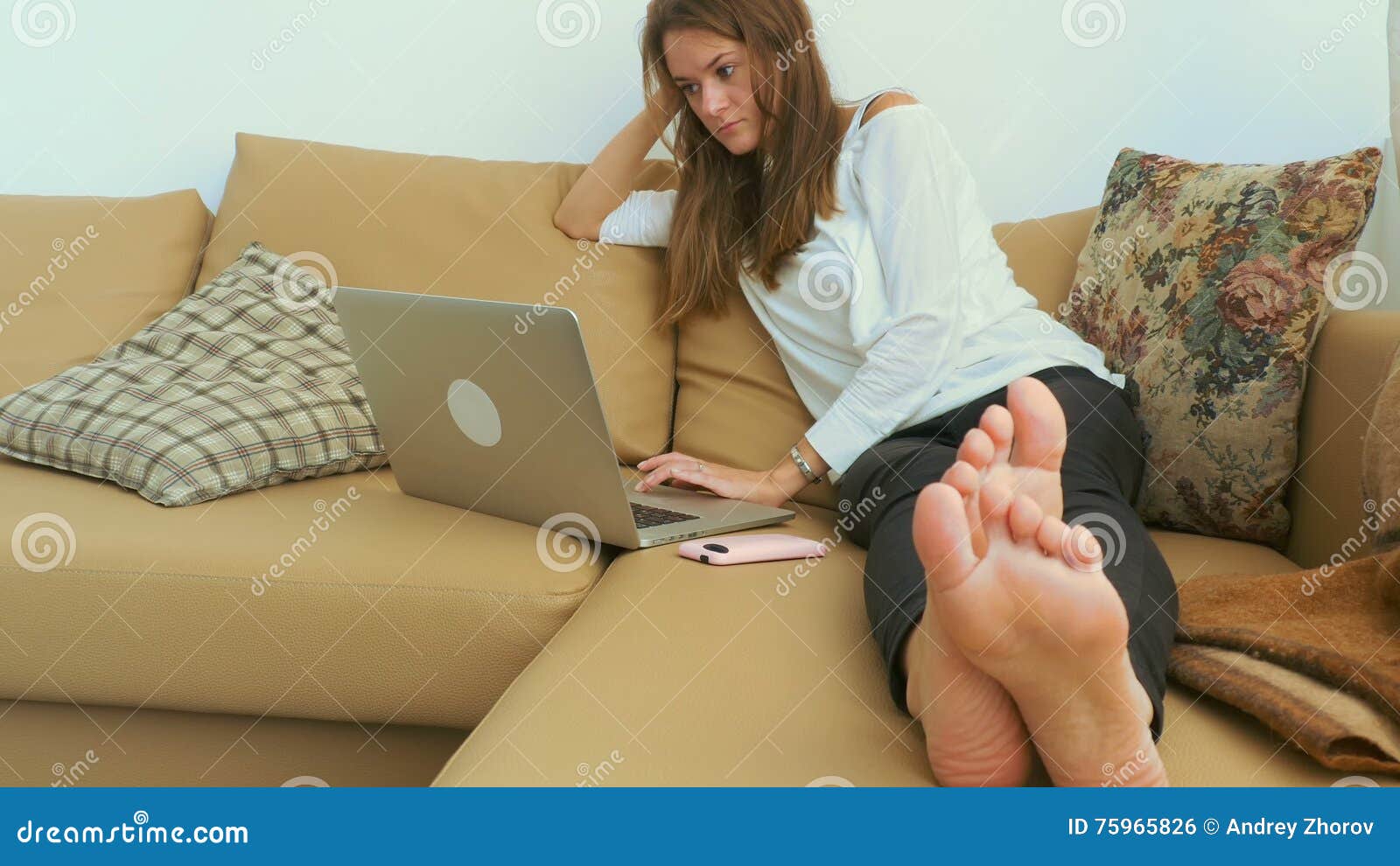 Woman Using Laptop While Lying On The Sofa Stock Footage Video Of