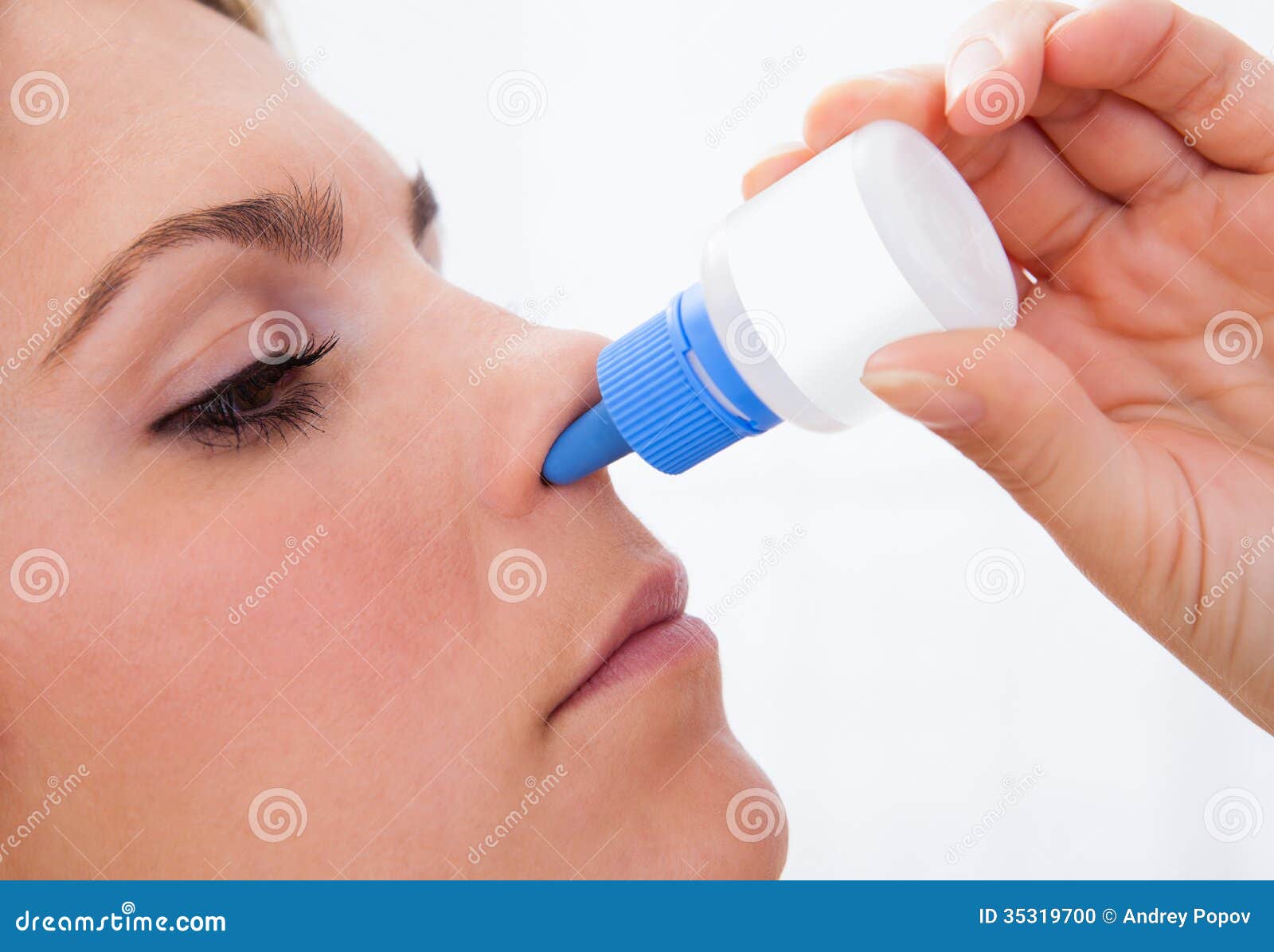 Woman using nasal spray stock photo. Image of breathe 35319700