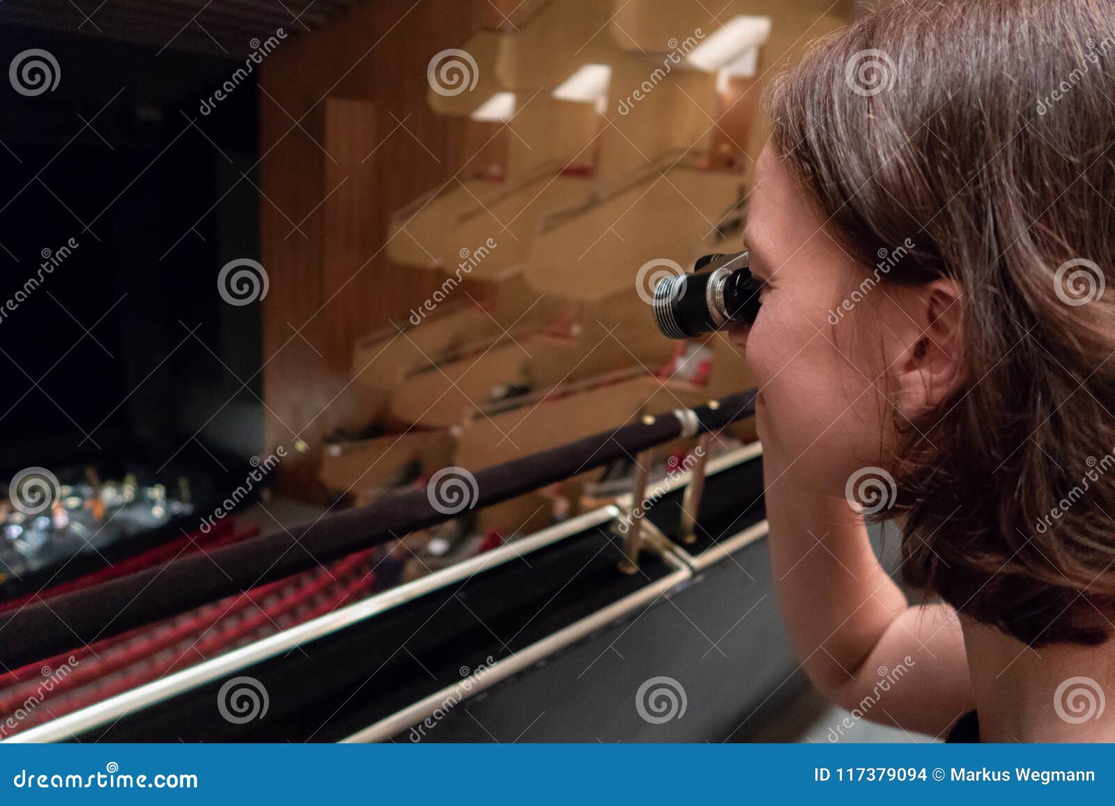 Woman is Using Opera Glasses in a Theatre Stock Photo Image of