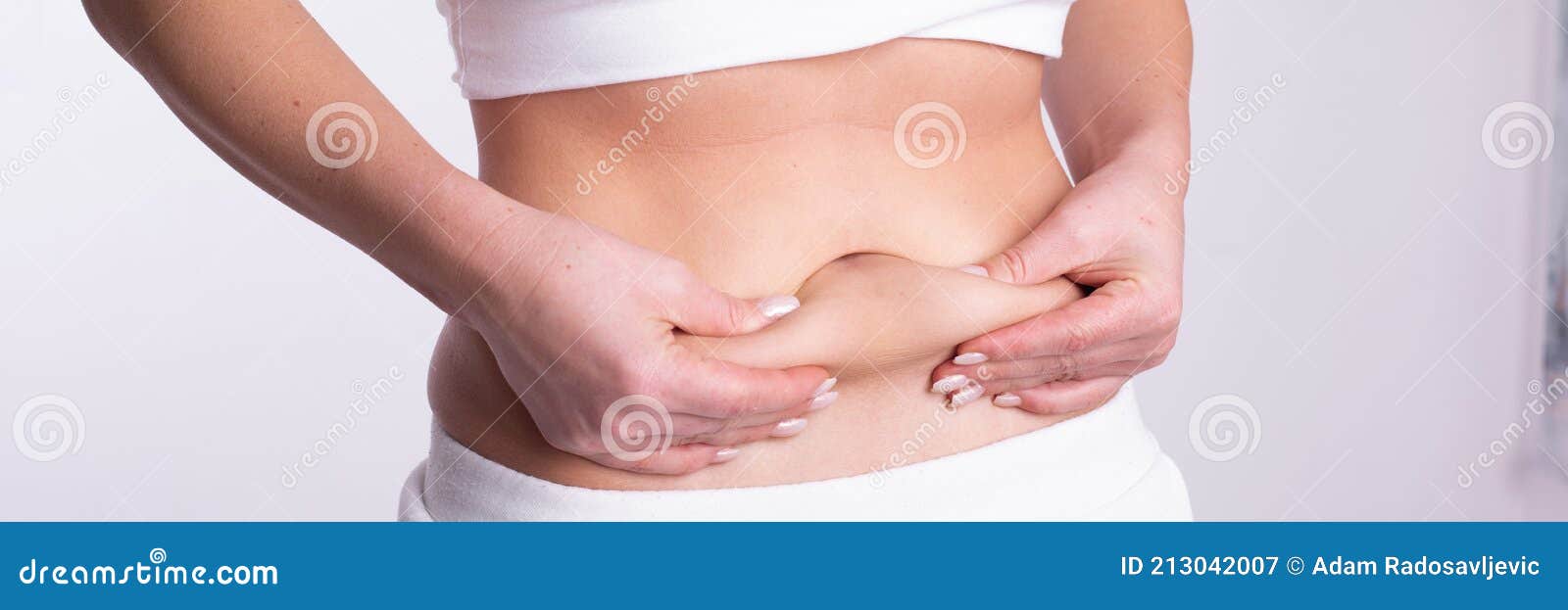 A Woman Using Pinch Test As One of the Methods for Measuring Body Fat