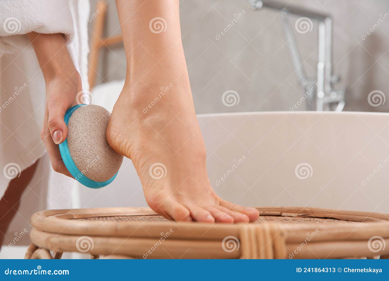 Woman Using Foot File For Removing Dead Skin From Feet In Bathroom Closeup  Stock Photo - Download Image Now - iStock