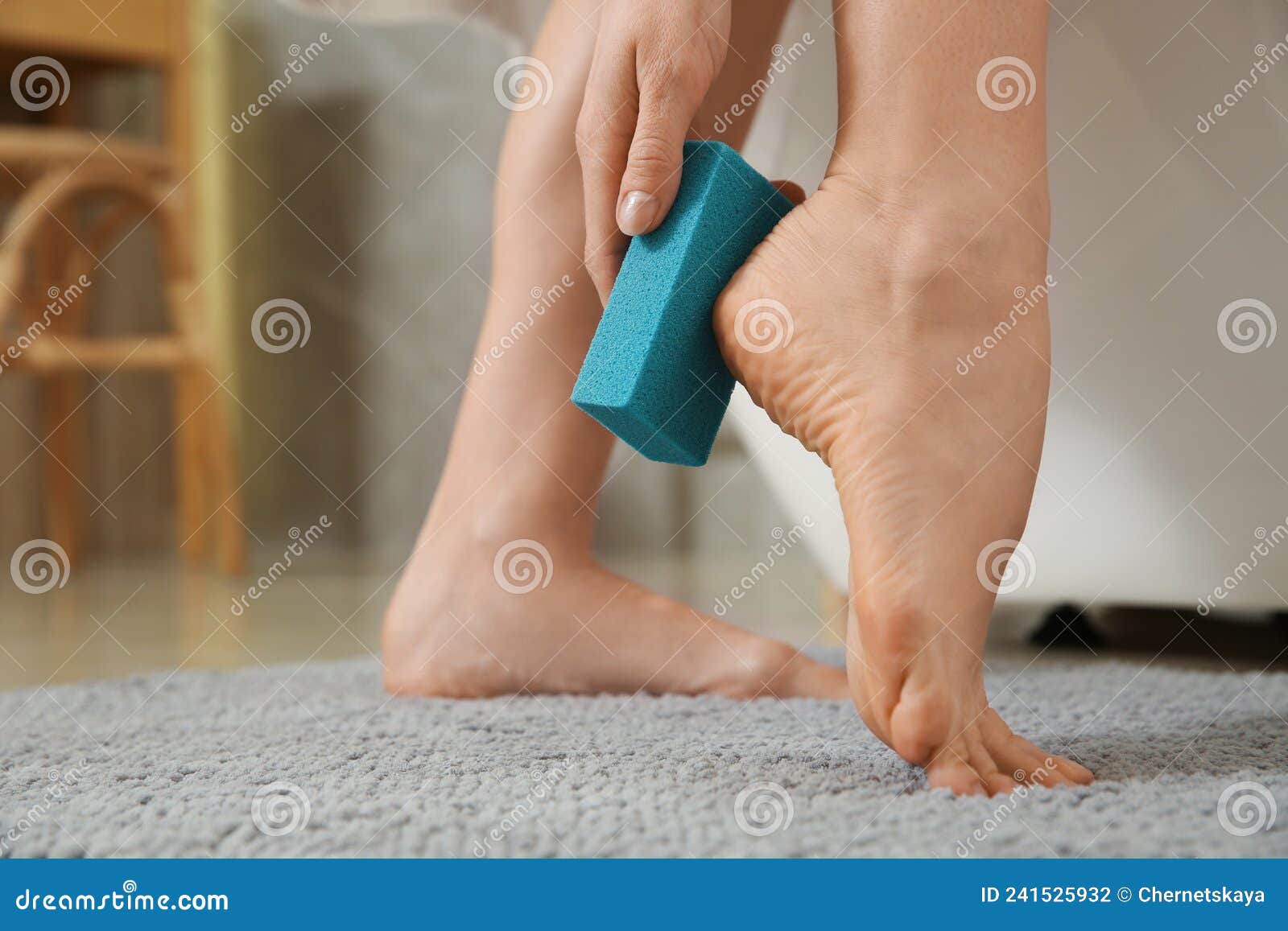 Woman Using Pumice Stone for Removing Dead Skin from Feet Indoors, Closeup  Stock Photo - Image of body, material: 241525932