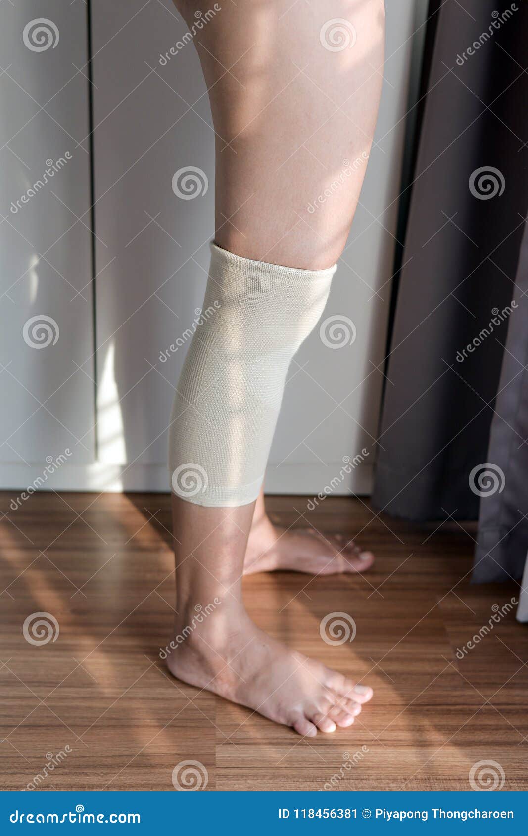 Woman Using Put On Elastic Bandage With Legs Having Knee Or Leg Pain Stock Image Image Of Closeup Health