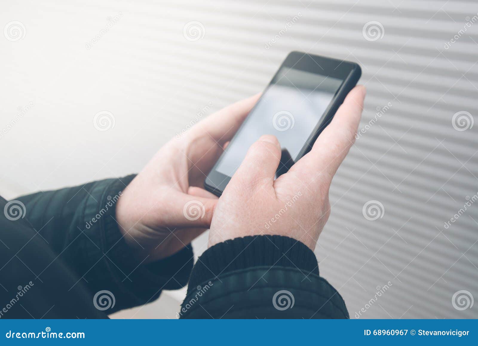 Woman Using Smartphone on the Street Facing the Wall Stock Image ...