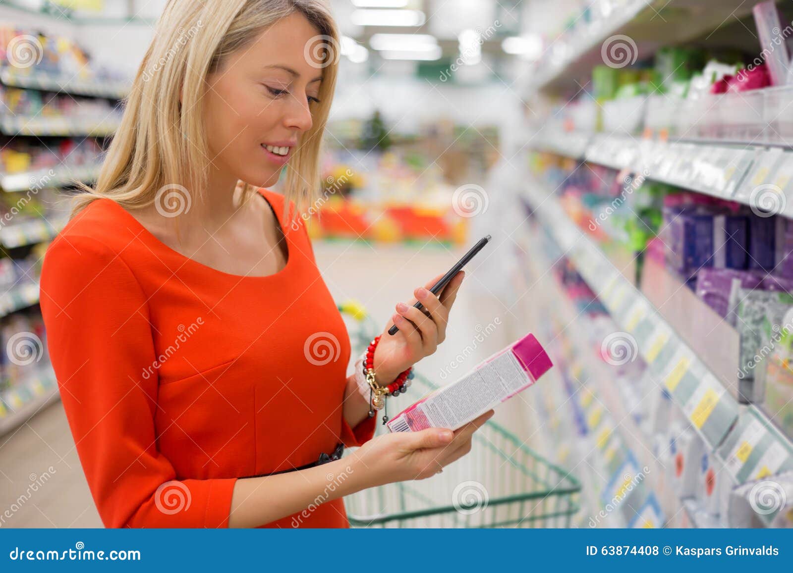 woman using smartphone to compare prices