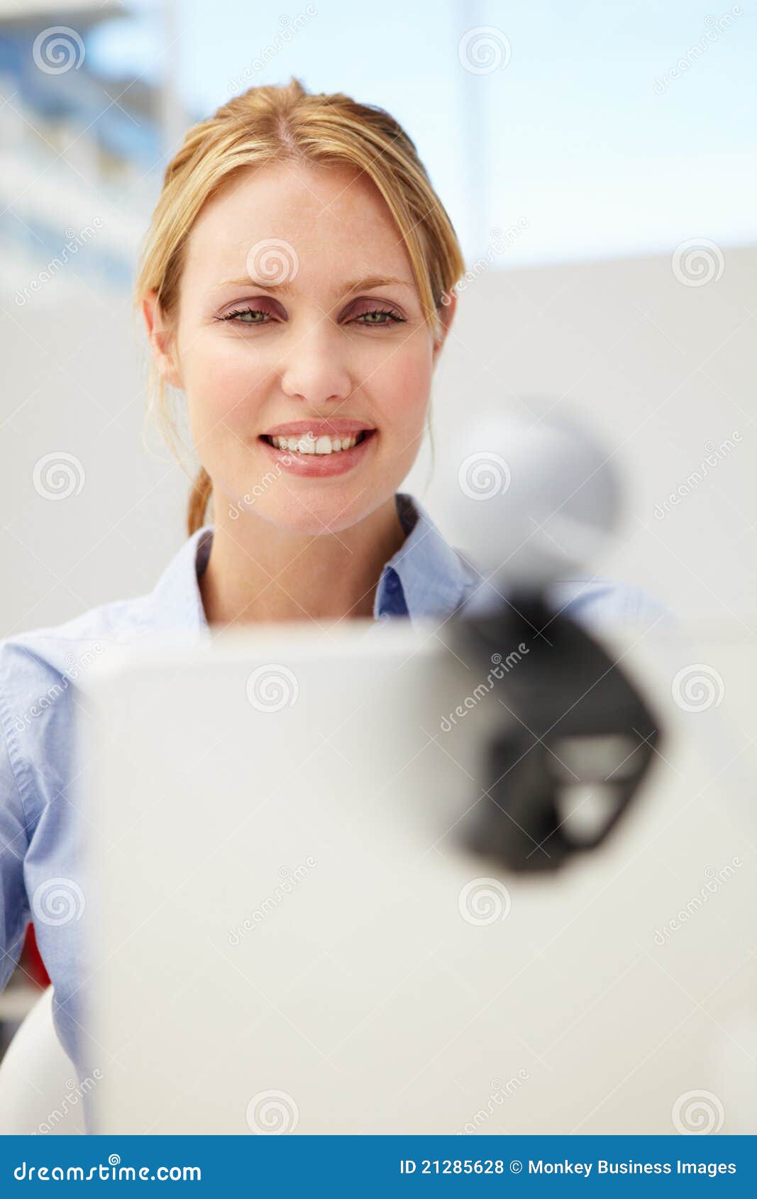 woman using webcam