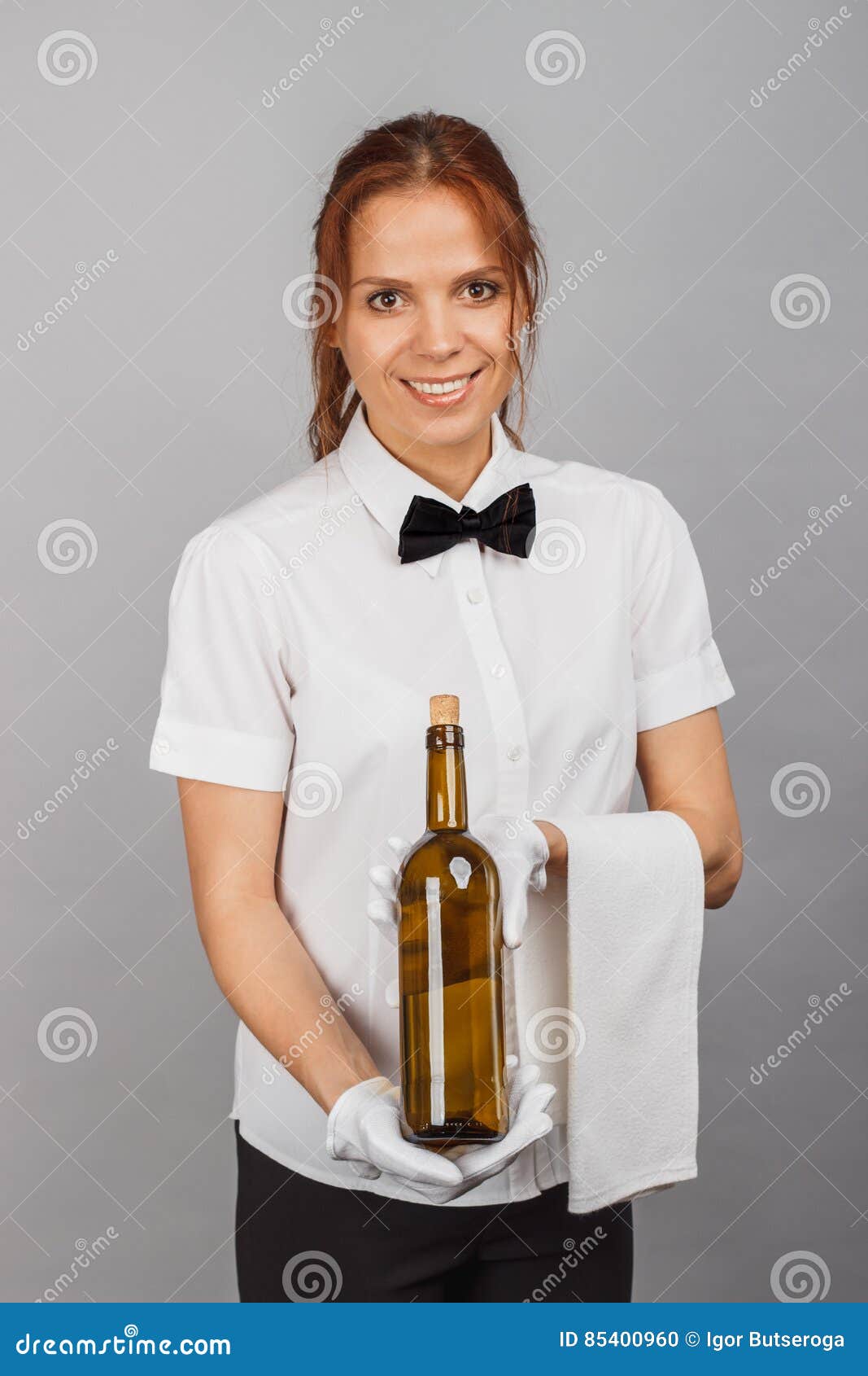 Woman Waitress with a Bottle of Wine Stock Photo Image of color