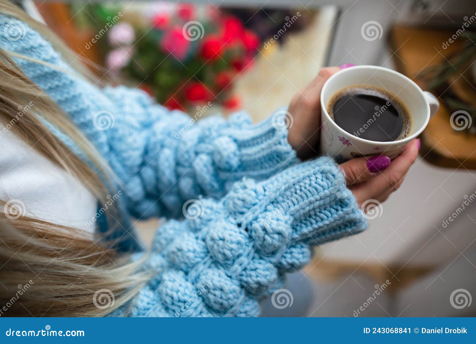 A Woman Warms Her Frozen Hands Against a Mug of Hot Coffee. Stock Image ...