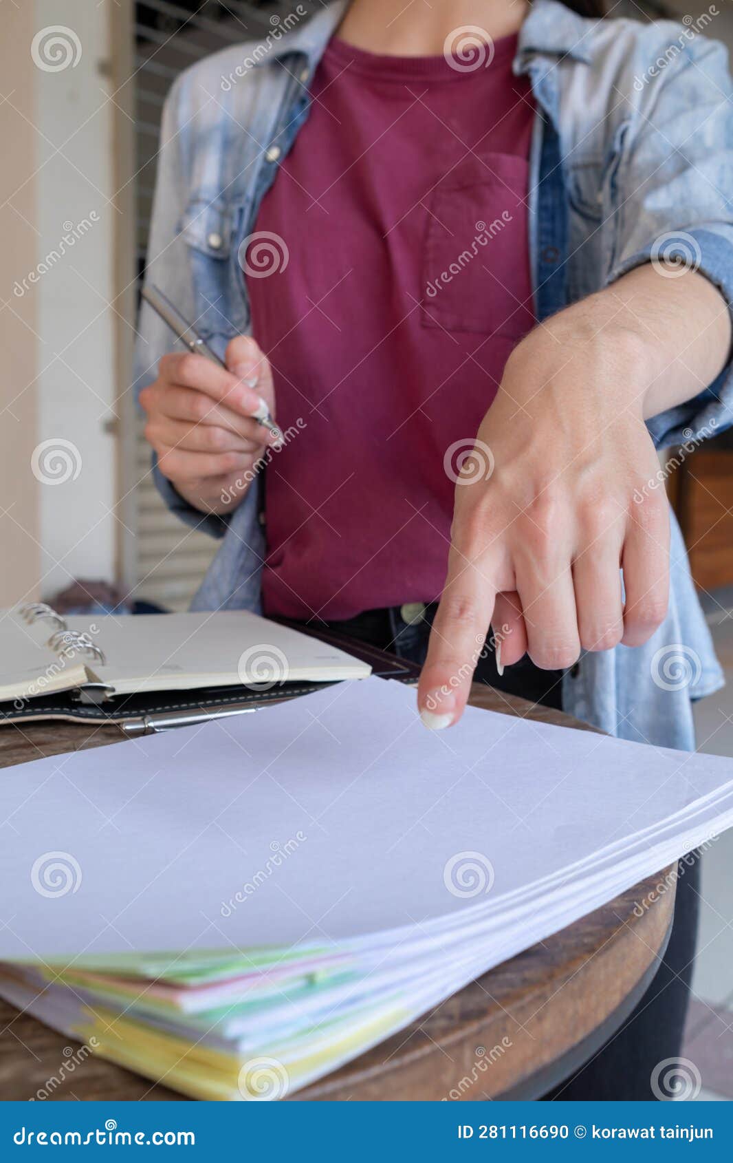 woman was sitting alone reviewing her lesson to understand and learn lesson before attending training and testing her knowledge of