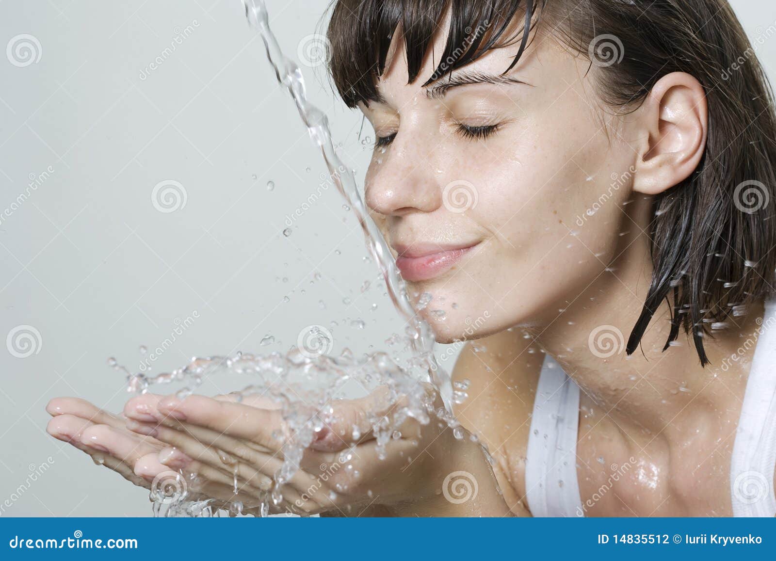 Woman washing her face stock photo. Image of adult, care 14835512
