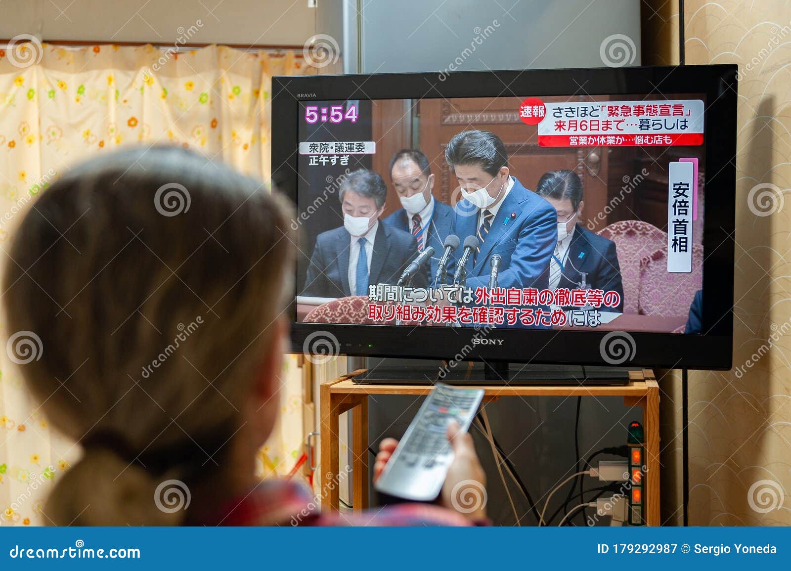 A Woman Watches Japan Pm Shinzo Abe On Tv About The Declaration Of A State Of Emergency To Contain The Spread Of The Coronavirus P Editorial Photography Image Of Covid19 Pandemic