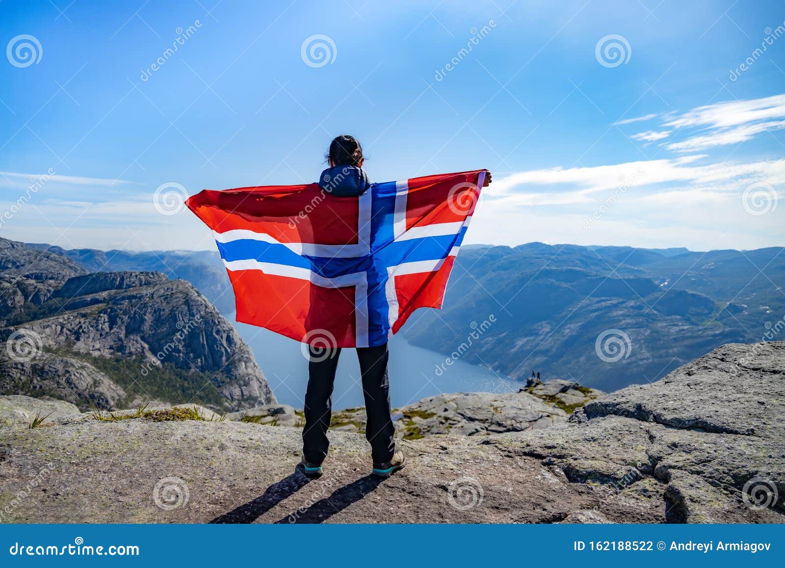 Woman with a Waving Flag of Norway on the Background of Nature Stock ...