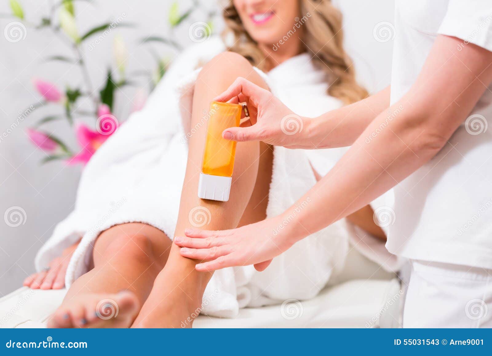 woman at waxing hair removal in beauty parlor