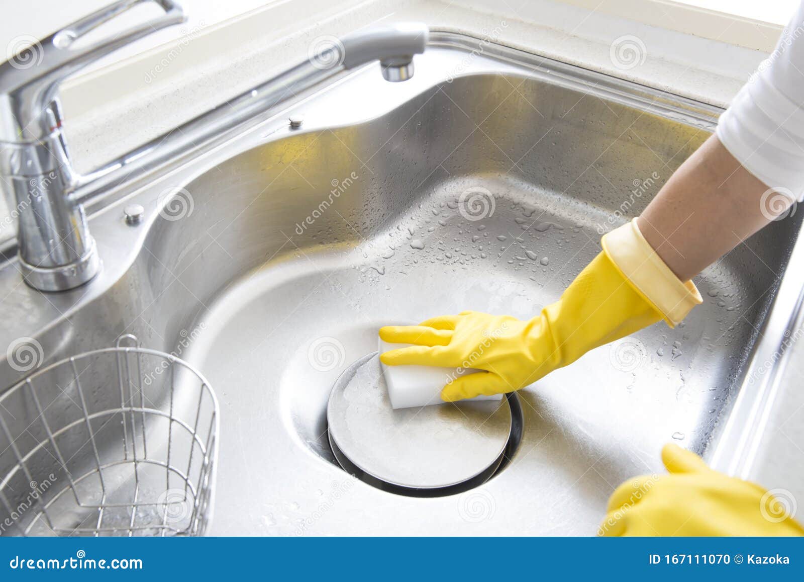 Cleaning the kitchen sink stock photo. Image of yellow - 23