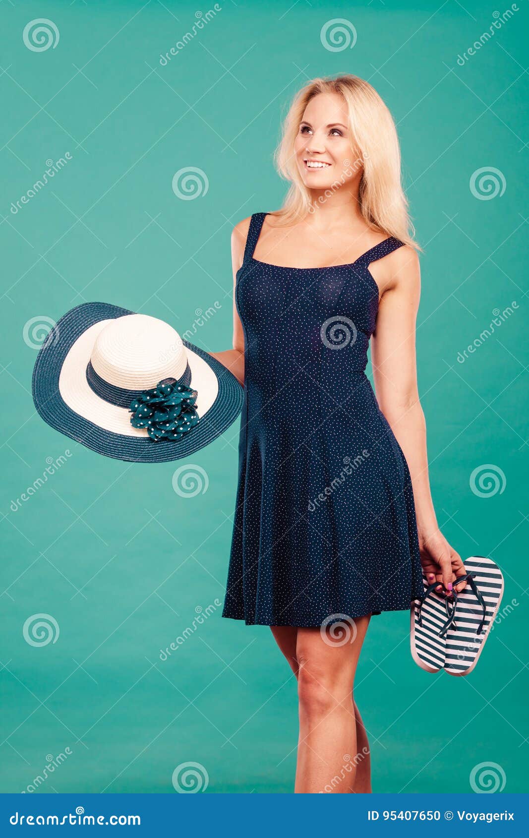 Woman Wearing Dress Holding Sun Hat an Flip Flops Stock Photo - Image ...
