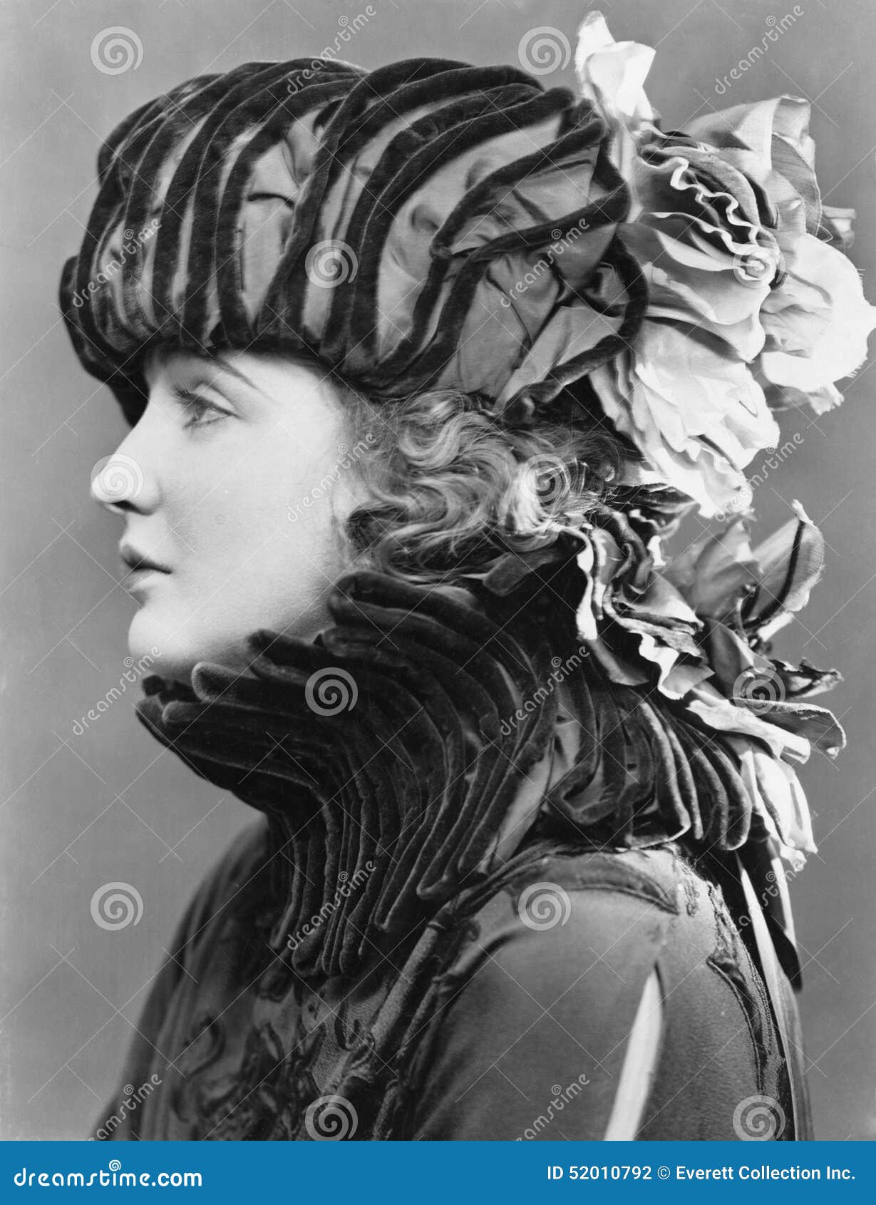 woman wearing elaborate hat