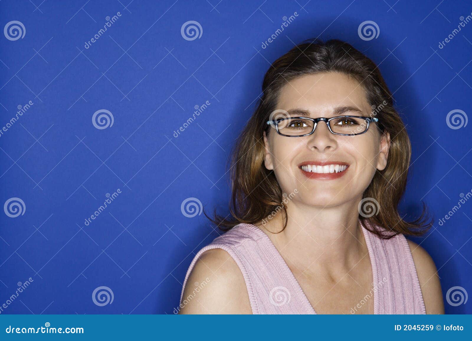 Woman wearing eyeglasses. stock image. Image of studio 2045259