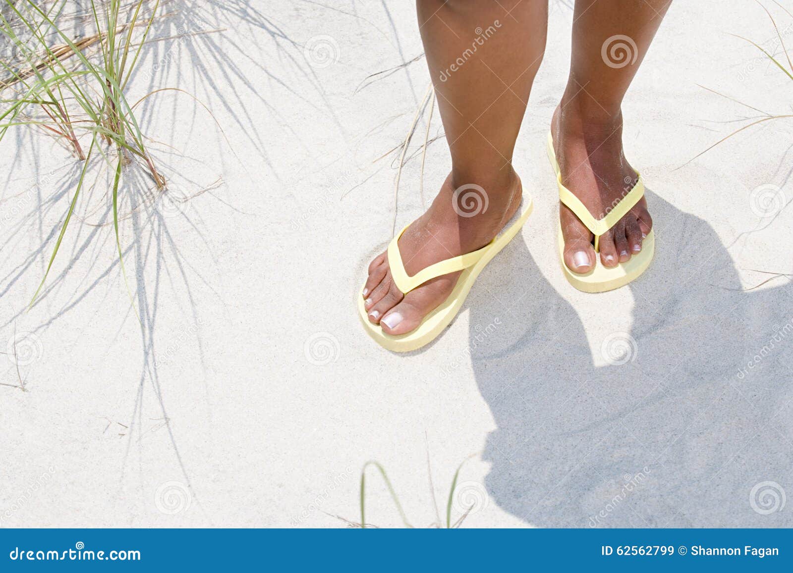 Woman wearing flip flops stock image. Image of relaxing - 62562799